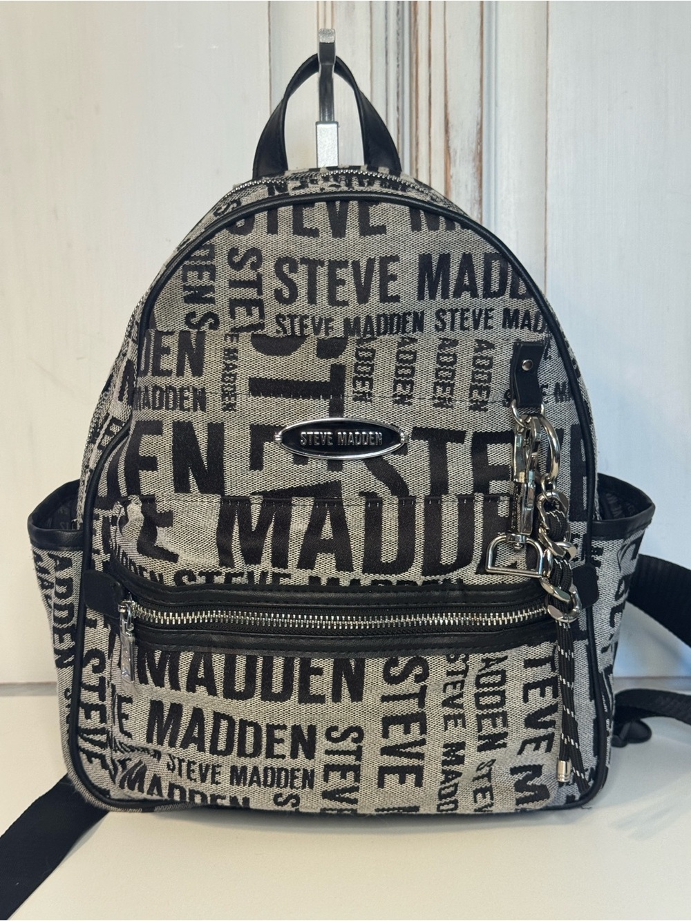Steve Madden Black and Gray Logo Backpack with Charm